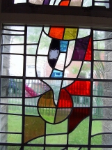 stained glass window depicting Confirmation