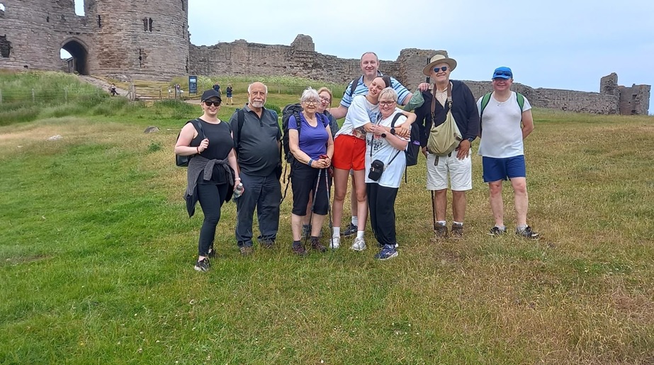 Walkers at the coastal ruins