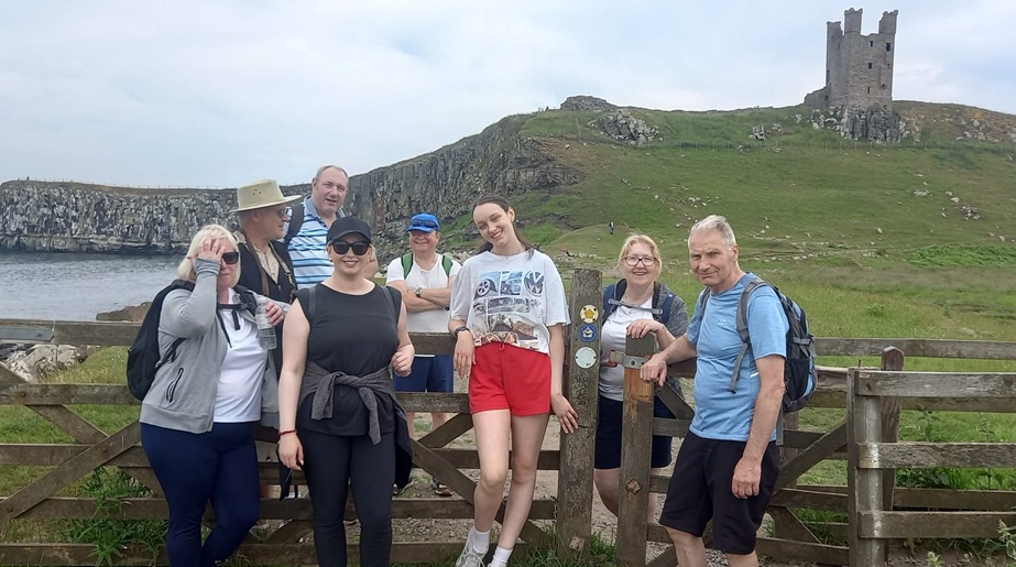 walkers sitting on gate