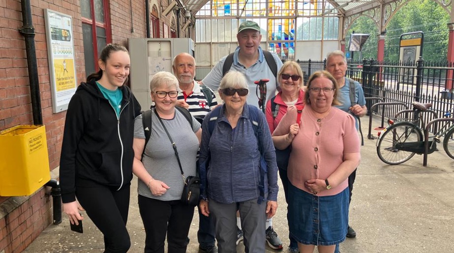 Walkers meeting at station