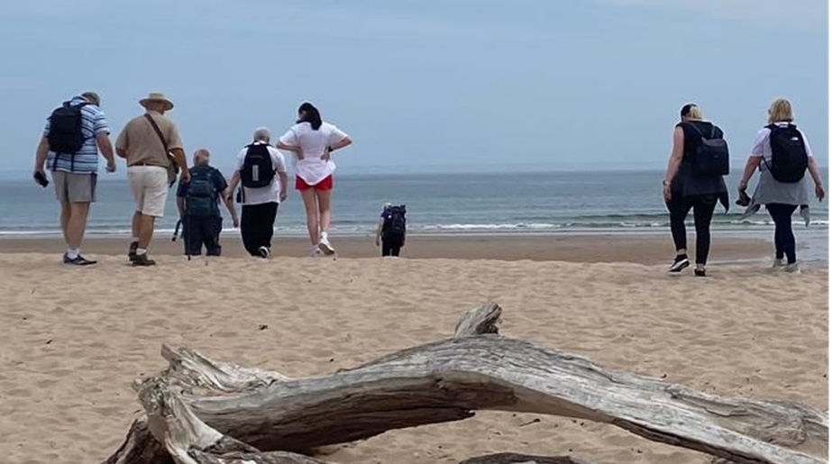 Walkers on the beach