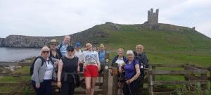 Walkers resting at the gate