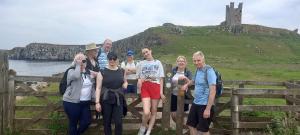 Walkers resting on the gate