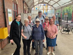 Walkers meeting at station